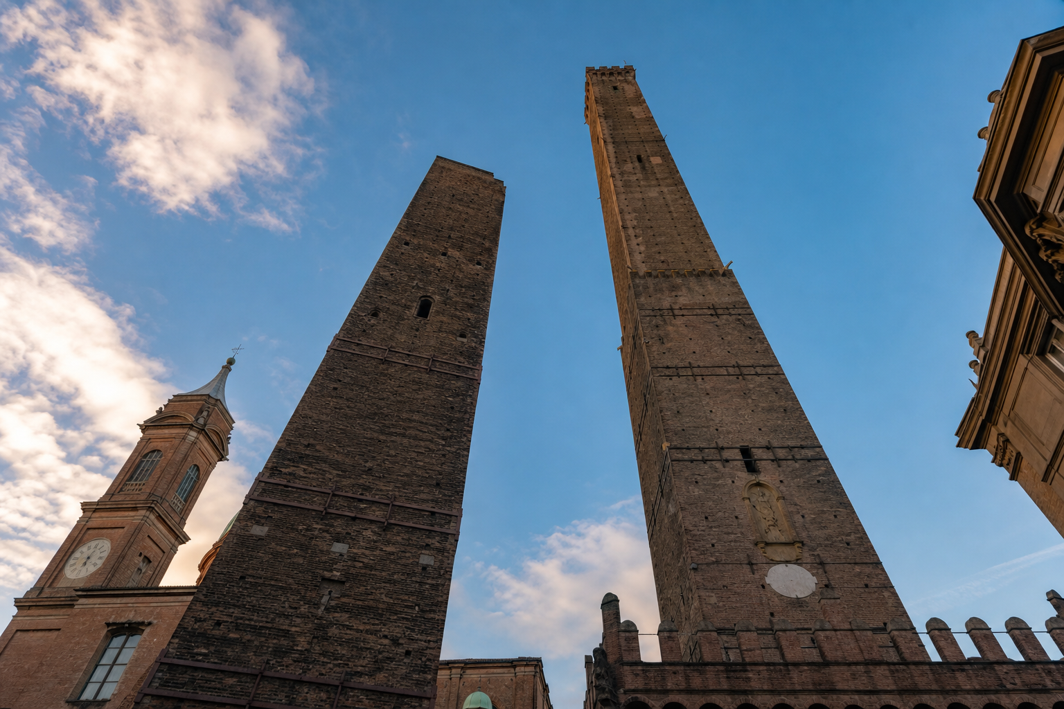 Create a from below view of Bologna, Italy famous towers